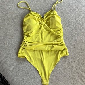 Yellow/green bodysuit